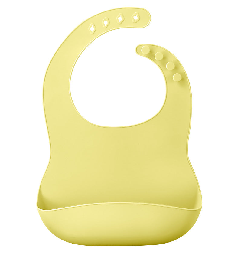 Bright yellow Waterproof Baby Bibs featuring a deep pocket design for catching spills by PureAura.