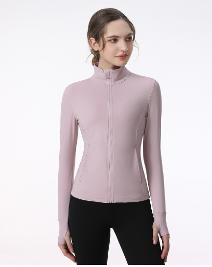 Light pink Women's Long Sleeve Zip Sports Jacket for Yoga & Running, featuring a fitted design by PureAura.