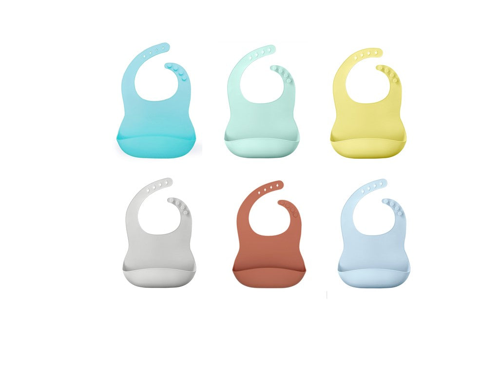 A vibrant assortment of Waterproof Baby Bibs in various colors displayed together, showcasing their flexible design by PureAu