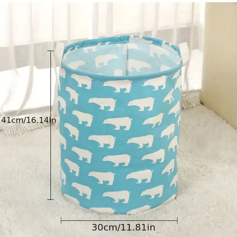 Bright blue Large Capacity Cotton Linen Laundry Basket adorned with white polar bears, perfect for stylish organization by Pu
