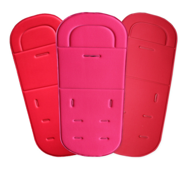 Three colorful Universal Cotton Baby Stroller Cushions in red and pink, showcasing soft materials and ergonomic design by Pur