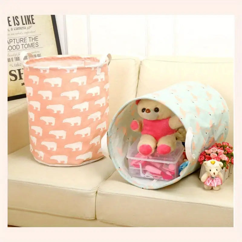 Two colorful laundry baskets displaying bear designs, one holding toys, showcasing the Large Capacity Cotton Linen Laundry Ba