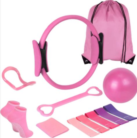 A colorful 13-Piece Yoga & Pilates Set featuring pink accessories, including a ring, ball, and resistance bands by PureAura.
