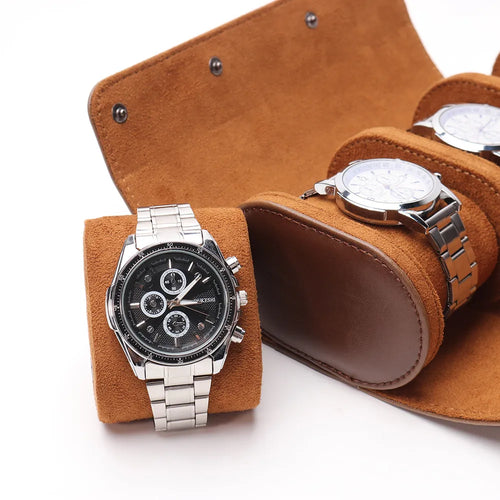 A sleek black chronograph watch is displayed in the 3 Slots Travel Watch Case by PureAura with soft suede interior.