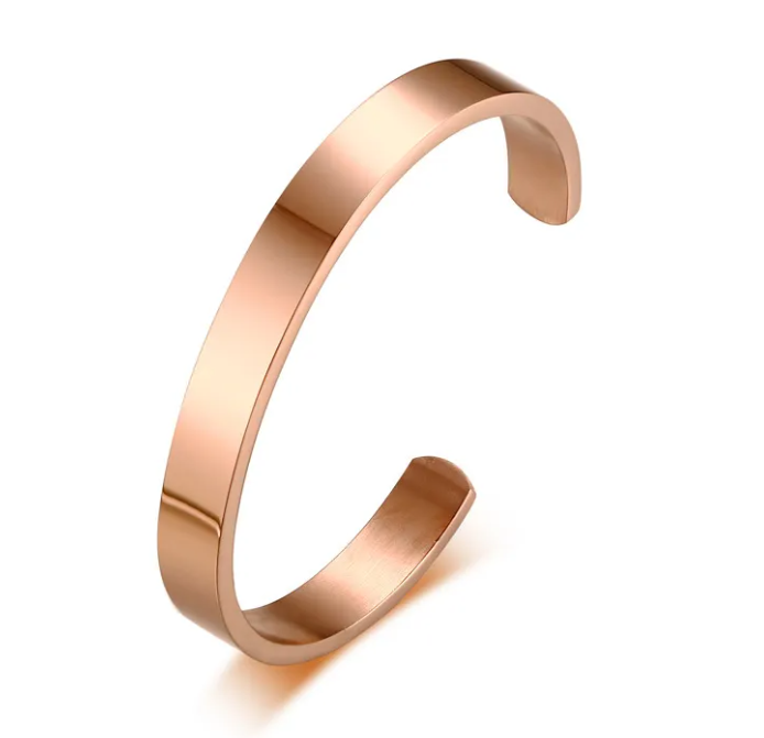 Sleek rose gold titanium steel bracelet with a minimalist design, showcasing elegance and style by PureAura.