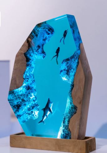 This artistic Resin Small Night Lamp features 3D diver and octopus designs in vibrant blue epoxy by PureAura.